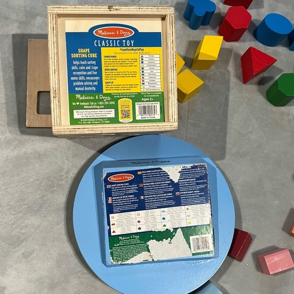 Melissa & Doug Wood Shape Sorting Cube and Clock - Classic Wooden Toy 12 Shapes - Picture 4 of 6